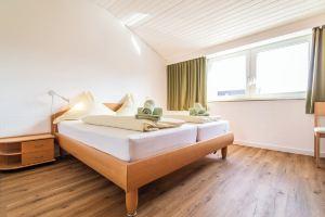 Ferienhäuser Ahlering Langeoog 4-8 Betten, Лангеог