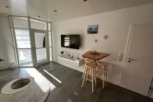 Cozy vacation apartment with canopy 5 minutes from the harbour, Каппельн
