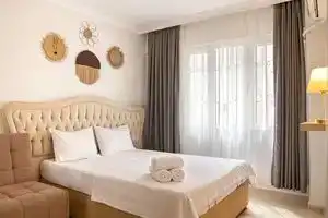 Spacious and Furnished Flat Next to Beach in Didim, Дидим