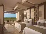Junior Suite With Two Double Beds And Garden View