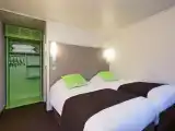 Quadruple Room (1 Double Bed + 2 Single Beds)