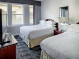 Mobility Accessible One Bedroom Two Queen Suite with Tub
