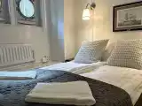 Twin Bedroom With Shared Bathroom