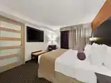 Suite-1 King Bed, Non-Smoking, Separate Living Area, Two Full Bathrooms, Sofabed, Microwave And Refrigerator