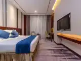 Deluxe Double Bed Room With Bustling City View