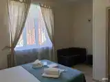 Трехместный номер Делюкс