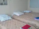 Койко-место в пятиместном номере с одноярусными кроватями