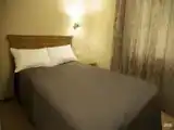 Одноместный номер (14 кв.м) с душем и большой кроватью