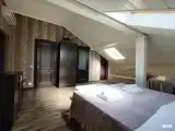 Семейный трёхместный номер с диваном в мансардной части отеля