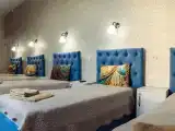 четырехместный с четырьмя односпальными кроватями