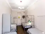 Кровать в общем четырехместном номере для женщин