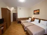 Корпус №5 Трехместный стандарт с балконом (три односпальные кровати)