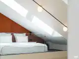 Студия двухуровневая мансардного типа