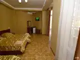 Комната люкс с 1 односпальной и 1 двуспальной кроватью