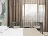 Двухместный номер Comfort c 1 комнатой (2 отдельные кровати)
