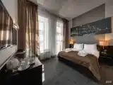 УЛУЧШЕННЫЙ НОМЕР С БАЛКОНОМ. ВИД НА ГОРОД