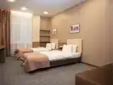 Стандарт (2 односпальных кровати и диван) вид в атриум