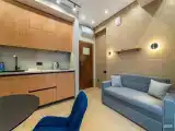 Апартамент с диваном