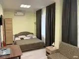Двухместный номер категории «Делюкс» с одной двуспальной кроватью