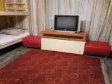 Кровать в 10-местном общем номере