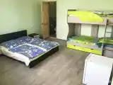 Четырёхместный номер Standard с балконом и с красивым видом из окна