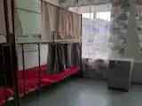 Кровать в 10-местном общем номере