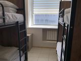 Кровать в 4-местном общем мужском номере (общие удобства)
