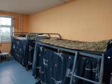 Кровать нижняя в 8-местном общем мужском номере