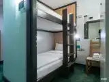 Двухместный капсульный номер с отдельными кроватями