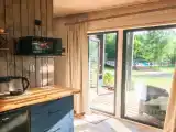 Четырёхместный семейный коттедж с балконом и с красивым видом из окна