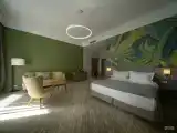 Джуниор Сьют с боковым видом на море