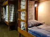 Кровать в 12-местном общем номере (удобства на этаже)