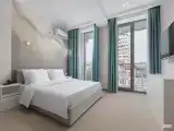 Двухместный полулюкс c 1 комнатой с балконом (двуспальная кровать)