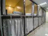 Кровать-капсула в общем номере для мужчин и женщин