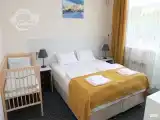 Семейный 2х-комнатный номер с одной 2-спальной или с двумя 1-спальными кроватями + 2-спальный диван, улучшенный, на 2м этаже
