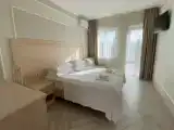 Трехместный номер Делюкс