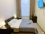 Улучшенный с большой кроватью