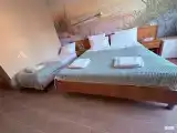 Четырёхместный номер Superior с балконом и с красивым видом из окна