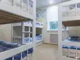 Кровать в номере для женщин с 6 кроватями