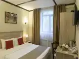 Стандартная комната с одной большой кроватью