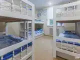 Кровать в общем номере с 6 кроватями