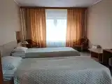 Номер полулюкс семейный с 4 односпальными кроватями