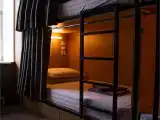 Нижнее место в многоместном капсульном номере (6 мест)