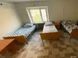 Кровать в общем номере c односпальными кровалями  (удобства на этаже) №18