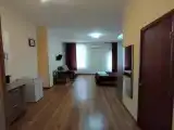 Трёхместный люкс с балконом и с красивым видом из окна