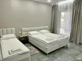 Трехместный номер Делюкс