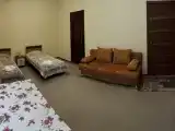 Двухместный номер с двумя односпальными кроватями и диваном