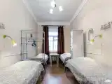 Кровать в общем четырехместном номере для мужчин