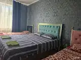 Номер комфорт семейный с 2 односпальными и 1 двуспальной кроватью