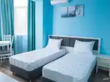 Пятиместные апартаменты с 2 комнатами с балконом и с красивым видом из окна
